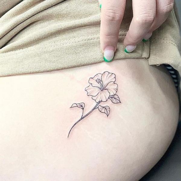 Hibiscus outline tattoo