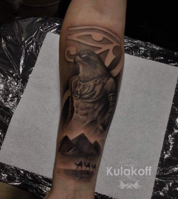 Horus and Pyramids with Eye of Ra tattoo