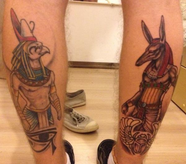 Horus and Seth tattoo on forearm