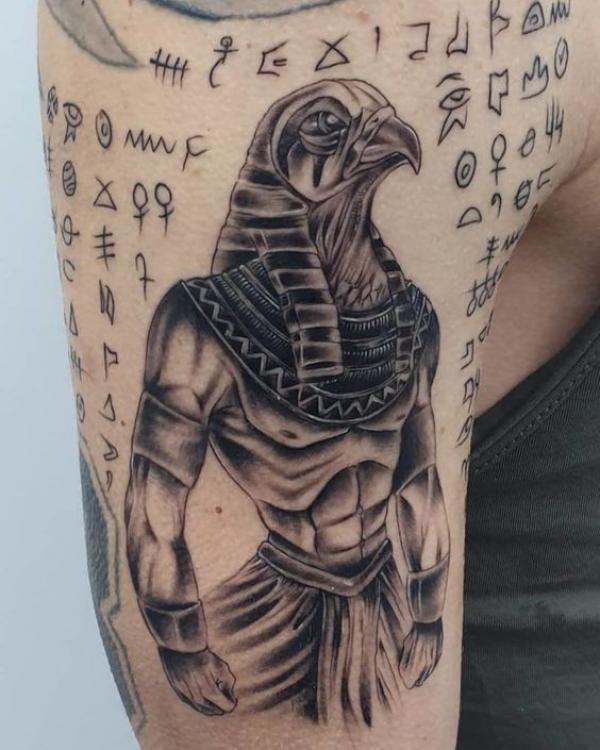 Horus with Hieroglyphics bicep tattoo