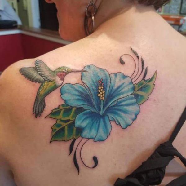 Hummingbird and blue hibiscus shoulder tattoo