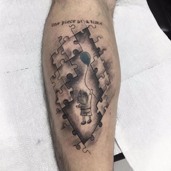 Kid and balloon with puzzles and words One piece at a time