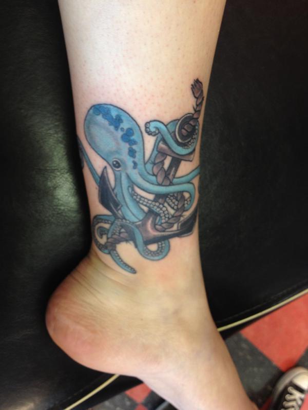 Kraken with anchor ankle tattoo