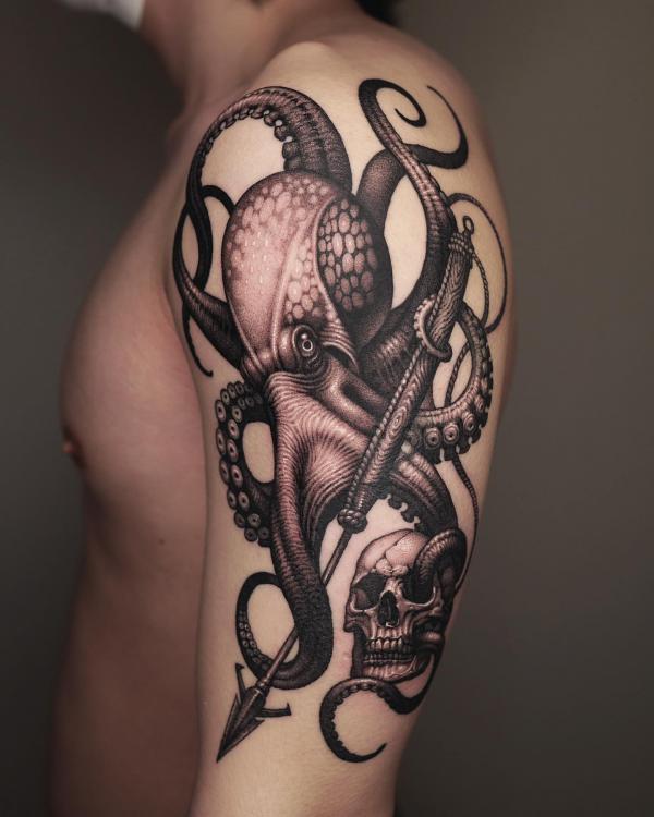 Kraken with arrow and skull tattoo