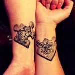Lock and key puzzle couple wrist tattoo