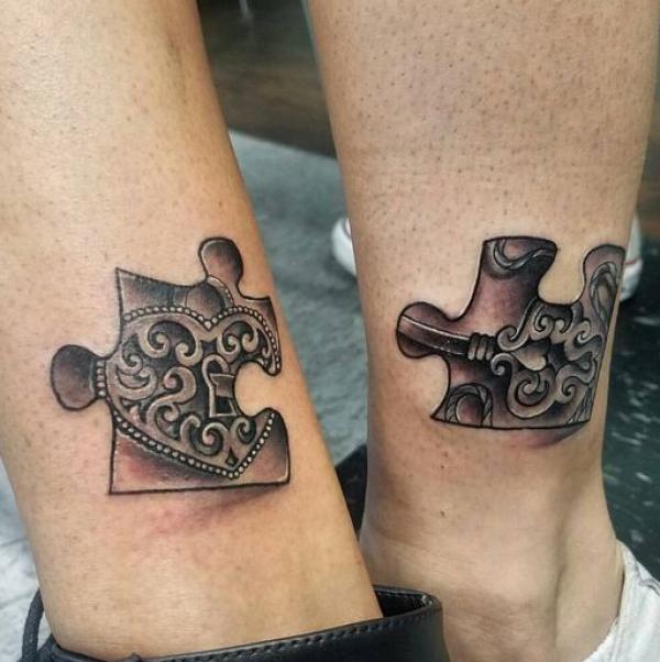 Lock and key puzzle matching tattoos