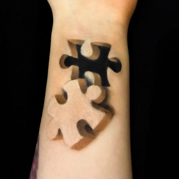 Luca Luces incredible 3D optical illusions puzzle tattoo