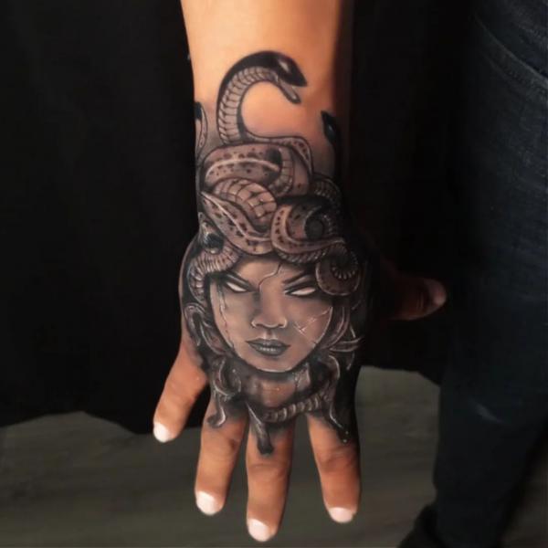 Medusa blackwork hand tattoo