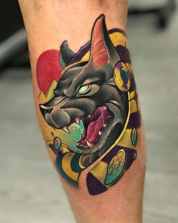 Neo traditional roaring Anubis tattoo