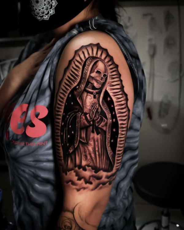 Praying Santa Muerte half sleeve tattoo
