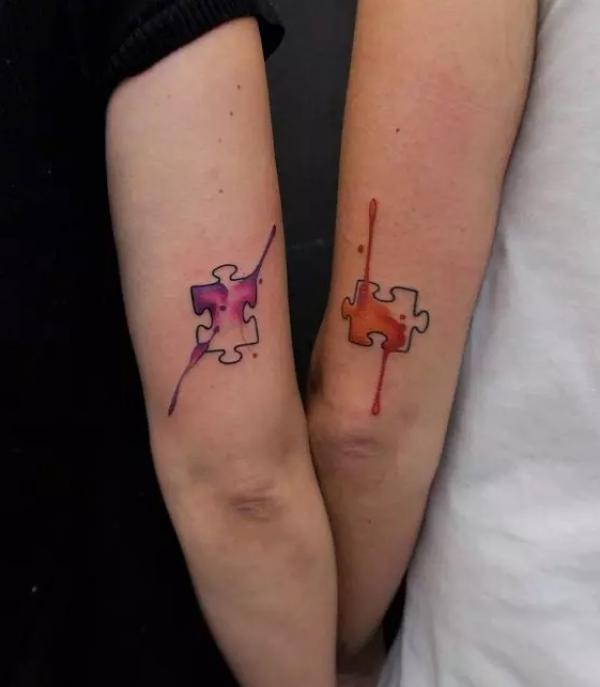Puzzle Pieces outline couple tattoo