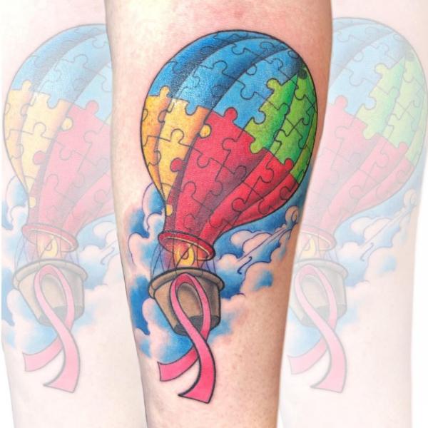Puzzle balloon with ribbon tattoo