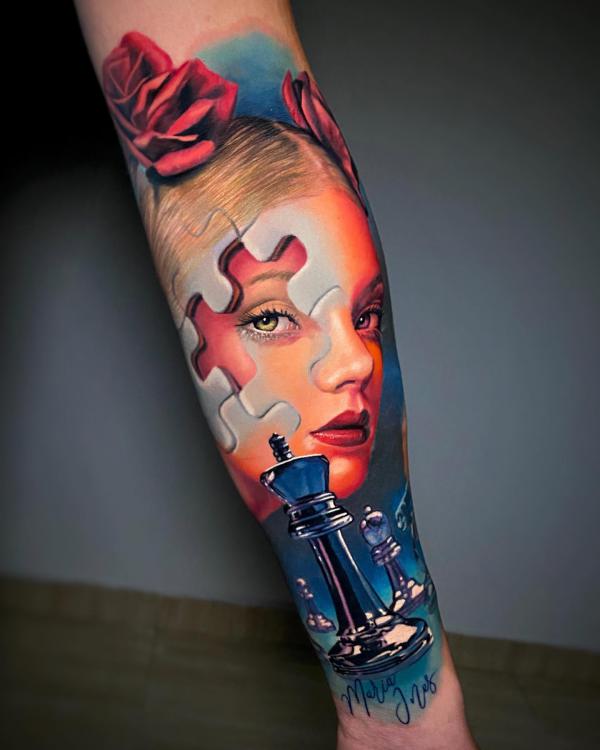 Puzzle face with rose tattoo