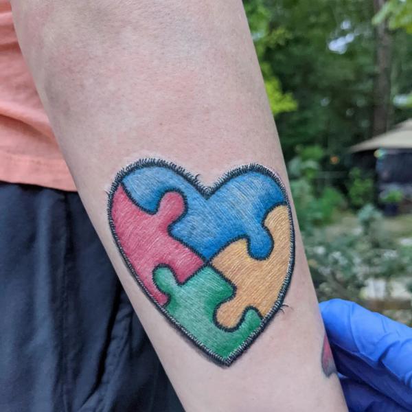 Puzzle heart patch tattoo