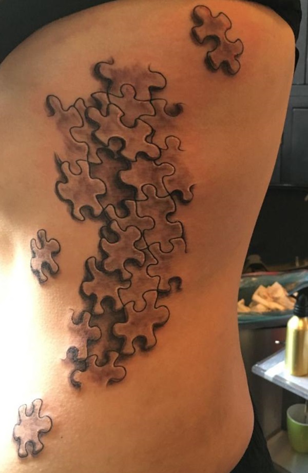 Puzzle side tattoo