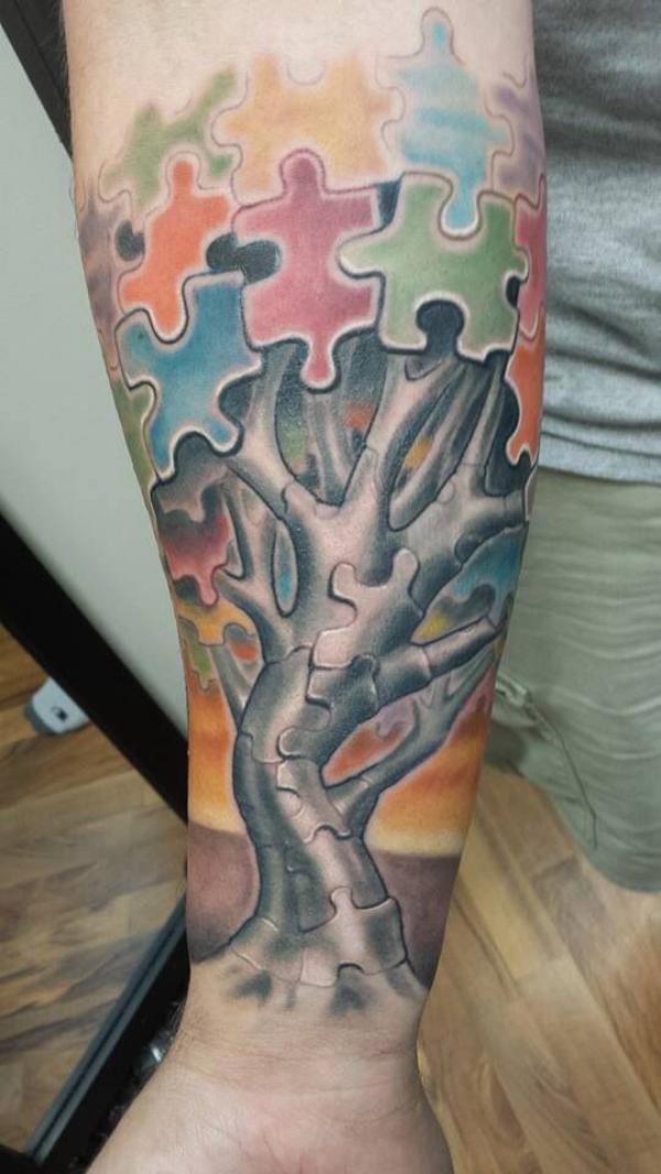 Puzzle tree tattoo
