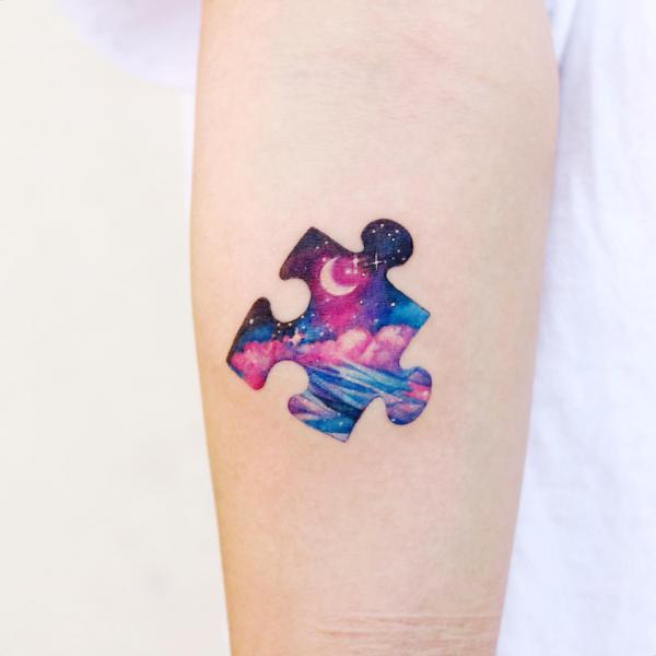 Puzzle with crescent moon and stars tattoo