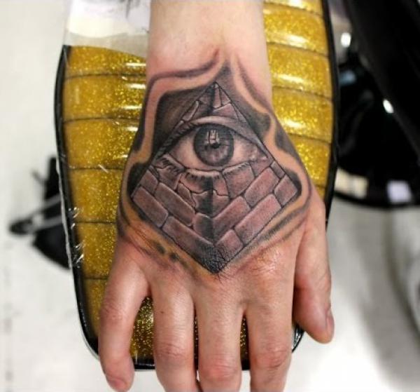 Pyramid with eye hand tattoo