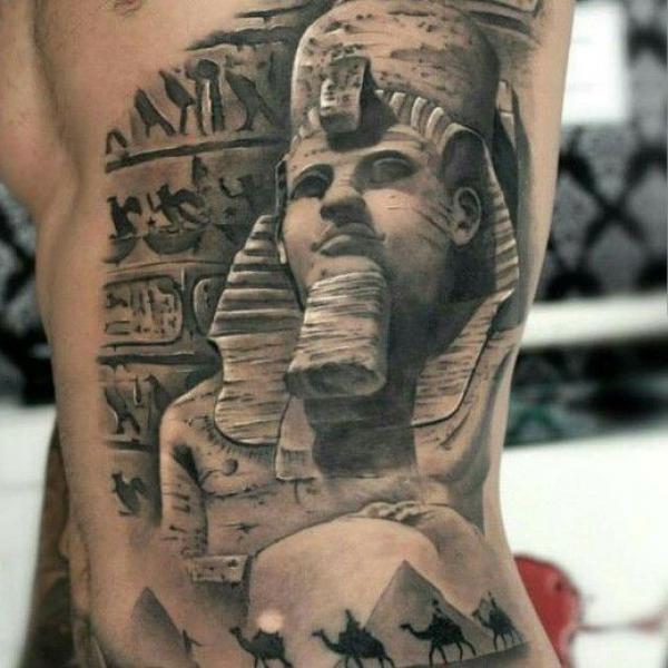 Ramses II statue and Hieroglyphics tattoo