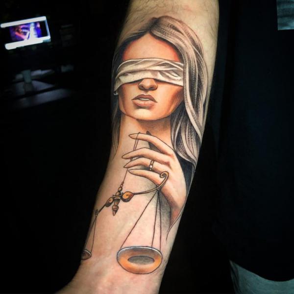 Realistic Lady with Scales of justice forearm tattoo