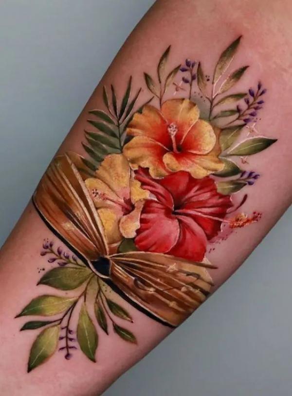 Realistic yellow and red hibiscus tattoo