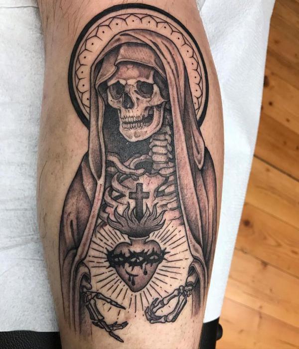 Santa Muerte and sacred heart tattoo on arm