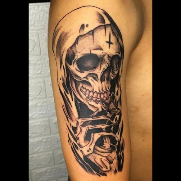 Santa Muerte half sleeve tattoo