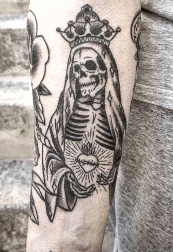 Santa Muerte holding sacred heart tattoo black and grey