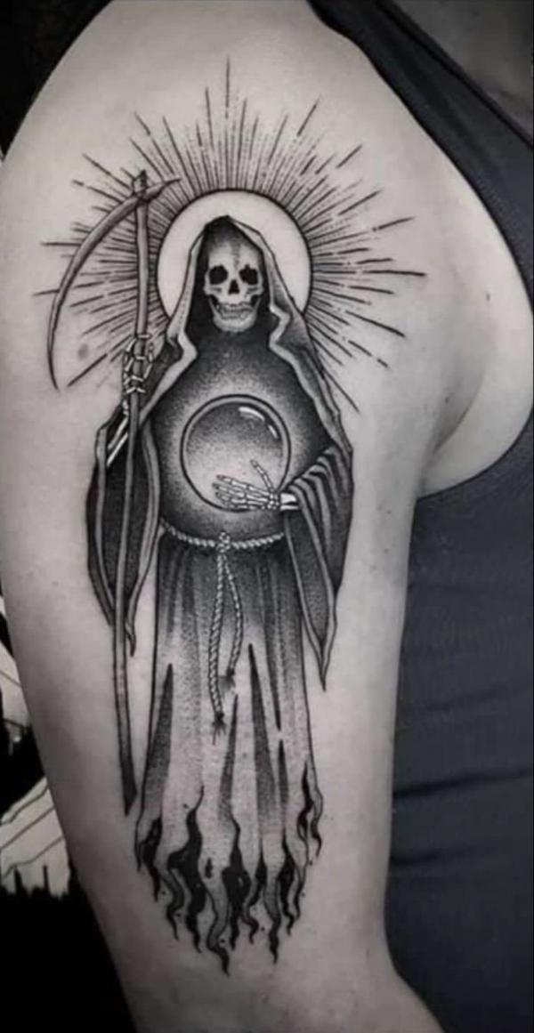 Santa Muerte holding scythe and globe tattoo black and grey