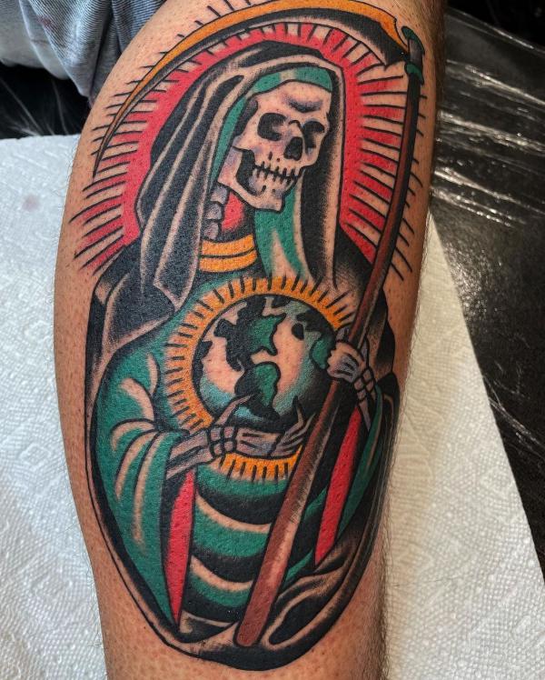 Santa Muerte holding scythe and globe tattoo traditional