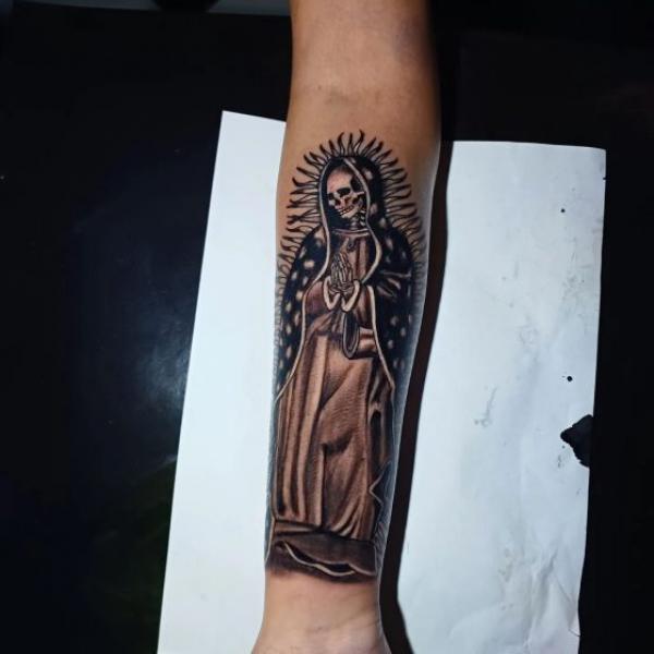 Santa Muerte inner forearm tattoo