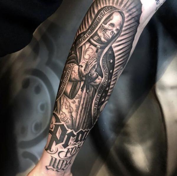 Santa Muerte tattoo on forearm