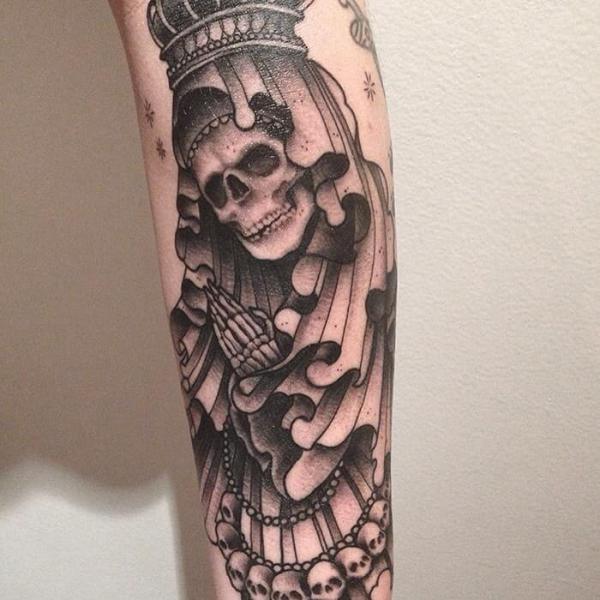 Santa Muerte with praying hands and crown tattoo