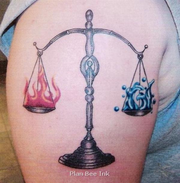 Scales of justice with fire and water tattoo