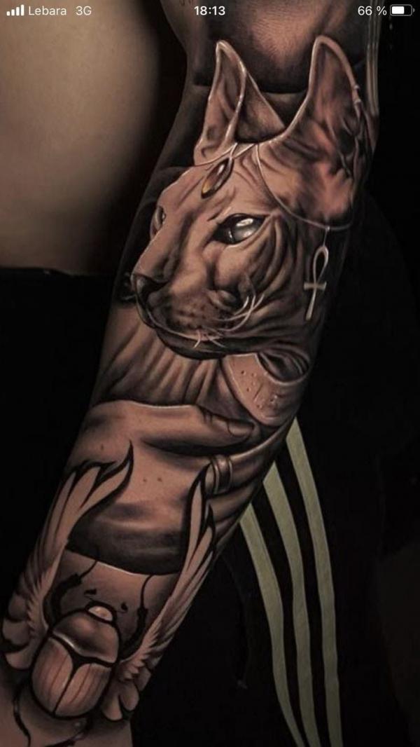 Scarab beetle and Bastet tattoo