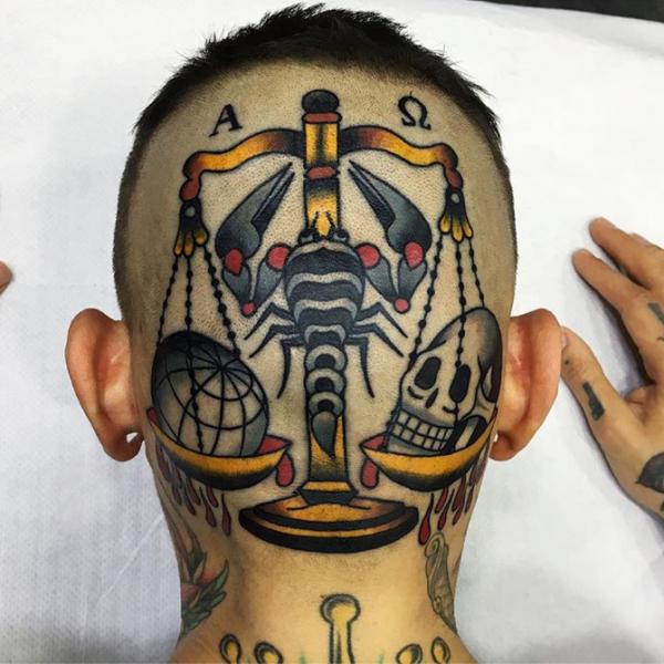 Scorpion scales of justice head tattoo