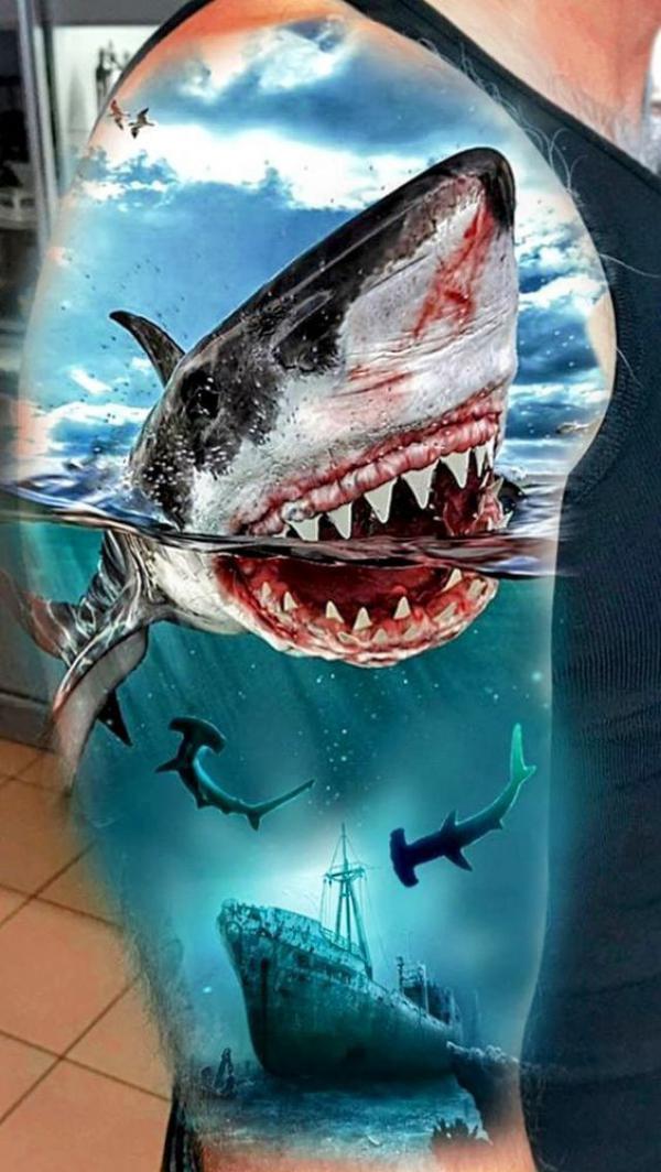 Shark and sunken half sleeve tattoo