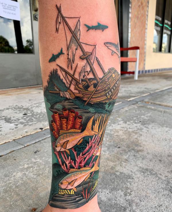 Shipwreck and fish tattoo