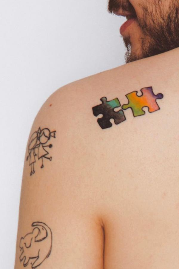 Shoulder puzzle tattoo