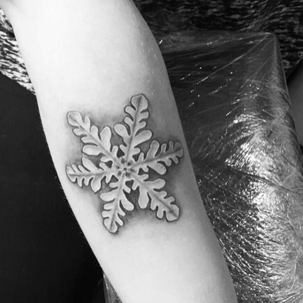 Single snowflake tattoo black and grey
