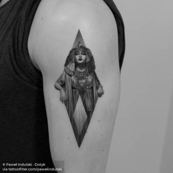 Small Cleopatra tattoo on upper arm