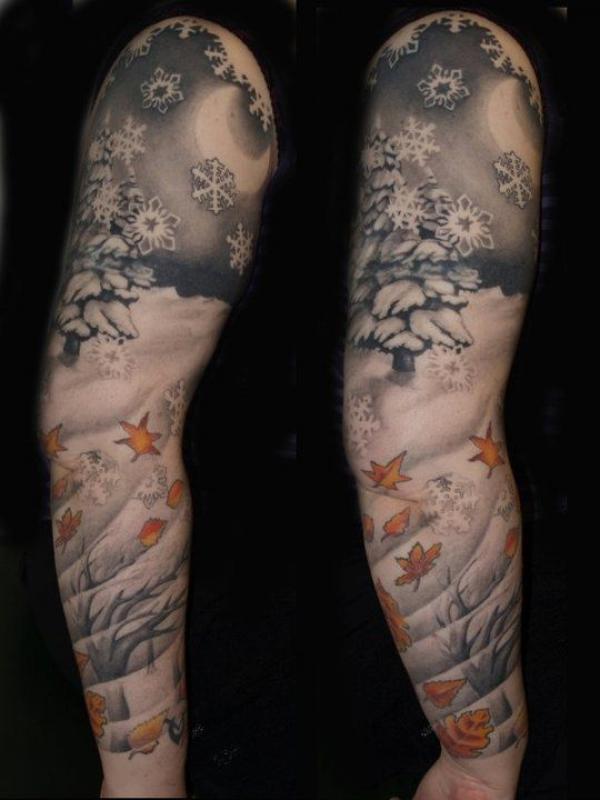 Snow snowflakes and falling leaves sleeve tattoo