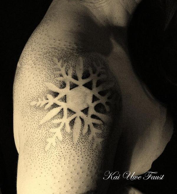 Snowflake shoulder tattoo