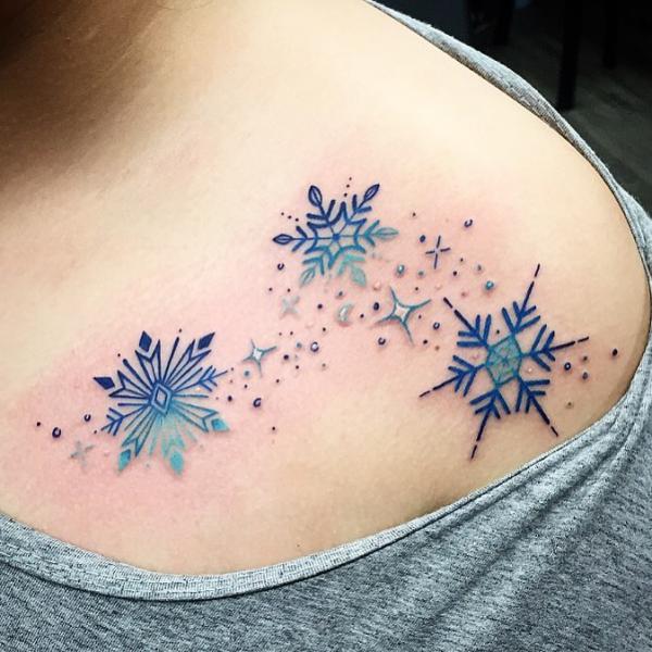 Snowflakes with stars tattoo
