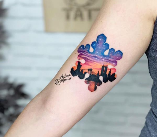 Sunset and starry night snowflake tattoo