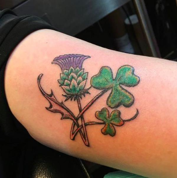 Thistle and clover tattoo