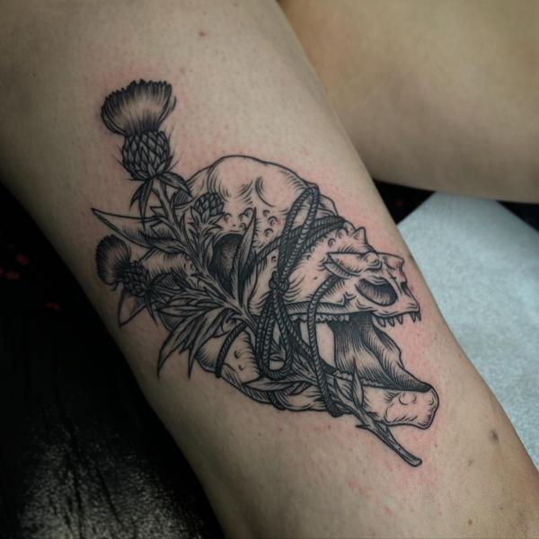 Thistle and skull tattoo