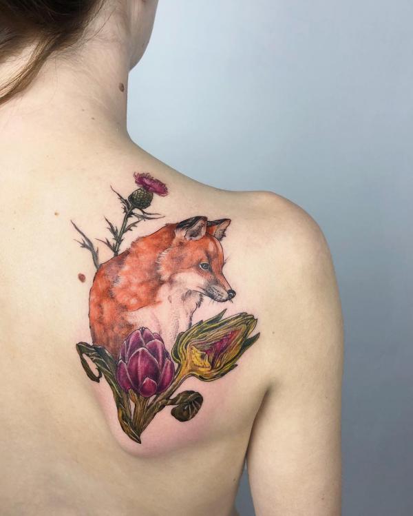 Thistle and wolf tattoo