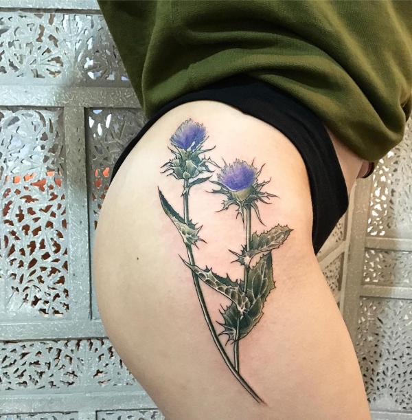 Thistle hip tattoo