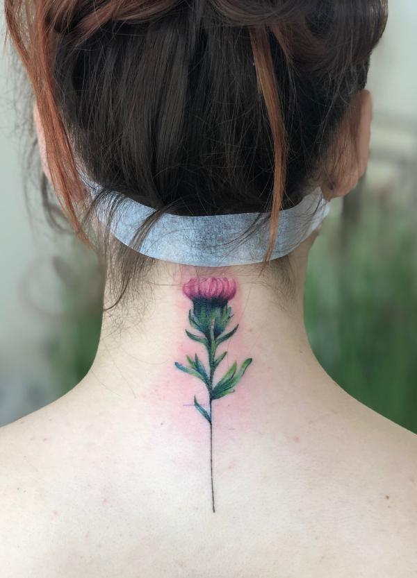 Thistle neck tattoo